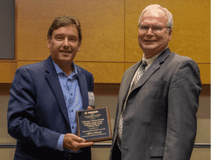 CWM CEO and President Eric Treiber accepts NADCA Award